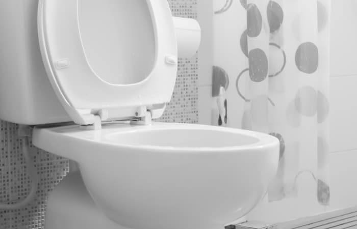 adjust a soft close toilet seat