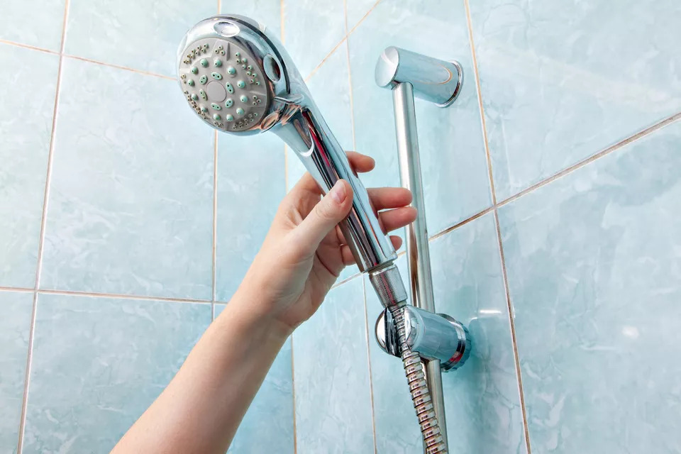 replace a shower head holder